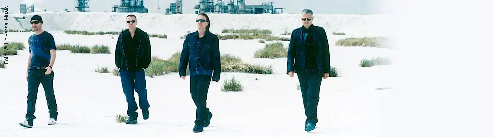 U2 – David Evans, Larry Mullen junior, Paul Hewson, Adam Clayton