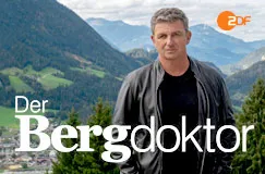 Text: "Der Bergdoktor" und das ZDF-Logo. Ein Mann steht vor einer alpinen Landschaft mit Bergen.