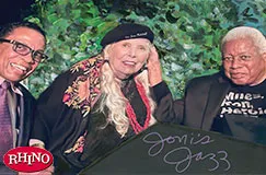 „Joni's Jazz“ ist handgeschrieben. Links ein Rhino-Logo. Eine Illustration von drei lächelnden Personen vor grünem Hintergrund.