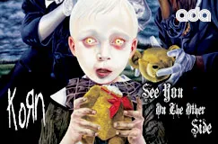 Text: "Korn", "See You On The Other Side". Ein blasses Kind hält einen Teddybär, bedrohlich wirkende Hände im Hintergrund.