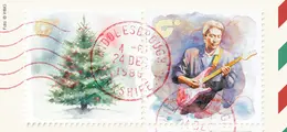 Illustration von zwei Briefmarken: Tannenbaum, Chris Rea mit Gitarre, E-Gitarre und Post-Stempel. 