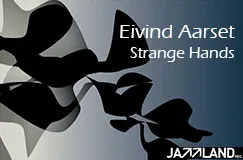 "Eivind Aarset Strange Hands" steht in weißer Schrift vor einem blauen Hintergrund mit schwarzen, abstrakten Formen.