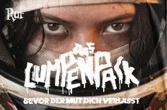 Text: "Das Lumpenpack: Bevor der Mut Dich verlässt." Nahaufnahme von Augen hinter einem Helmvisier, kraftvoller Ausdruck.