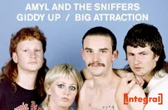 Text: "AMYL AND THE SNIFFERS GIDDY UP / BIG ATTRACTION." Vier Personen vor blauem Hintergrund, Integral-Logo.