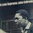 „A Love Supreme/John Coltrane“, zeigt ein Schwarz-Weiß-Porträt eines nachdenklich blickenden Mannes.