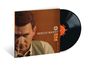 "SHELLY MANNE 2 3 4"; ein Albumcover, ein Mann mit Zigarette, Vinyl-Schallplatte mit orangenem Label rechts.