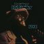 Text oben: "Donny Hathaway", unten: "Live". Ein Sänger mit Hut singt leidenschaftlich in einem dunklen Ambiente.