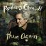 Text: „Rodney Crowell, Then Again“. Ein Mann mittleren Alters mit grauen Haaren vor einem abstrakten Hintergrund.