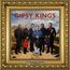 Text: "GIPSY KINGS FEAT. TONINO BALIARDO, Historia". 
Sechs Männer mit Gitarren, Landschaft im Hintergrund, goldener Rahmen.
