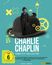 "Charlie Chaplin Complete Collection, FSK ab 6 freigegeben." Chaplin in Anzug und Melone mit Affe, Zahnräder, leuchtendes Design.