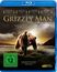 "Grizzly Man" oben. Mann und Bär in Landschaft darunter. Text: "In der Natur bestehen Grenzen. Ein Mann hat sie 13 Jahre lang überschritten."