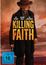 „KILLING FAITH“. Schauspieler: Guy Pearce, DeWanda Wise, Bill Pullman. Ein Mann im Western-Outfit mit Hut und Gewehr.