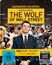 "The Wolf of Wall Street" in gelbem Kasten. Mann im Anzug, Party-Szene im Hintergrund. 4K Blu-ray Angaben. FSK 16.