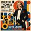 "Dieter Thomas Kuhn mit dem Südfunk Tanzorchester SWR Big Band. Gute Laune mit Posaune." Ein Mann in Frack lächelt.
