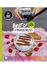 Best of #MixGenuss. Top 50 Instagram Rezepte. Eine Schüssel Dessert auf rosa Tuch mit Himbeeren und Keks.