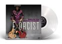 SELWYN BIRCHWOOD EXORCIST. Eine Person in lilafarbener Kleidung hält zwei Gitarren. Links eine transparente Vinyl-Schallplatte., LP