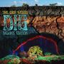 „The Grip Weeds DiG Deluxe Edition“ in leuchtenden Farben. Eine Höhlenszene mit musizierenden Silhouetten darunter., CD