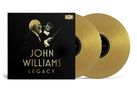 "John Williams Legacy" in goldener Schrift auf schwarzem Hintergrund. Darunter ein Dirigent mit Taktstock, zwei goldene Schallplatten.