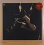 "The Hanseroth Twins | Vera" und kleines Logo links oben. Silhouette von Person mit Mikrofon, sepiafarben., LP