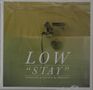 Text: LOW "STAY" (originally performed by Rihanna). Eine Badewanne mit Wasserhahn im Hintergrund., Single 7"