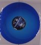 Der Text "TRAUMWELTEN" ist auf einem blauen Vinyl-LP-Label zu sehen., Single 12"