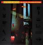 Depeche Mode, Black Celebration; links und rechts grafische Symbole, in der Mitte ein hochformatiges, dunkles Foto., LP
