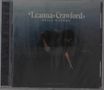 "Leanna Crawford Still Waters Deluxe" in weißer Schrift. Frau beugt sich nach unten, dunkler Hintergrund., CD