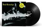 „Dead Kennedys“ in gelber Schrift. Schwarz-weißes Cover zeigt brennendes Auto. Eine Vinyl-Schallplatte daneben., LP