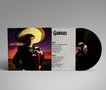 Juan Gabriel steht in traditioneller Kleidung vor einem Sonnenuntergang. Links steht sein Name. Ein schwarzes Vinyl ist zu sehen., LP
