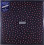 "Limited 35th Anniversary Edition", "Seamonsters", "Deep Sea Blue Biovinyl". Muster aus roten Pfeilen auf dunklem Hintergrund.