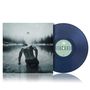Text "ATARAXIA" auf einem blauen Vinyl. Cover zeigt tätowierten Mann auf zugefrorenem See, Bäume im Hintergrund., LP