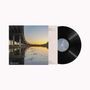 Es ist eine Schallplatte. Links im Cover ein Autobahnbrückenfoto bei Sonnenuntergang, der Text beschreibt Musikstücke., LP