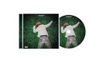 "PROJECT X" oben. Eine Person in weißer Kleidung liegt auf grünem Gras. CD-Cover und CD haben dasselbe Bild., CD