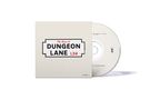 "The Boys of DUNGEON LANE L24" steht auf einem CD-Cover, das eine Straße imitiert. Eine CD mit Logo ist teilweise sichtbar.