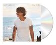 „keith urban“ und „flow state“. Ein Mann am Strand im weißen Shirt mit Tätowierungen, lächelt seitlich. CD-Beilage rechts., CD