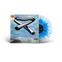 "Tubular Bells, Mike Oldfield" auf einem Albumcover. Abbildung von Röhren vor einem wolkigen Himmel und einer Vinyl-Schallplatte., LP