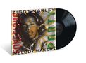 "Ziggy Marley and the Melody Makers" oben, "Conscious Party" links, grüner und gelber Text, Porträt eines Mannes auf Plattencover., LP