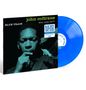 Cover mit den Texten: „john coltrane blue note 1577“, „BLUE TRAIN“. Blaues Vinyl mit Label. Portrait einer Person.