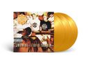 Text: "Moment of Truth". Zwei Personen stehen an einem Tisch, einer von ihnen trägt ein T-Shirt mit einem Logo. Goldene Schallplatten., 3 LPs