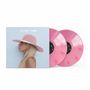 Text: "LADY GAGA / JOANNE". Ein Albumcover mit einer Profilansicht einer Person mit rosa Hut, zwei pinke Vinyl-Schallplatten., 2 LPs