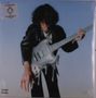 Ein Mensch in schwarzer Jacke hält eine Gitarre, die zu schmelzen scheint, vor einem klaren Himmel., LP