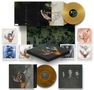 Boxset von "Imagine Dragons" mit Illustrationen von Händen und Vögeln, goldene und braune Schallplatten., 3 LPs