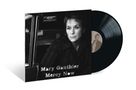 „Mary Gauthier Mercy Now“ und „20th Anniversary Pressing“ auf einem Vinyl-Cover. Schwarzes Weißfoto einer Frau., LP