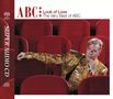 „ABC Look of Love The Very Best of ABC“, Super Audio CD. Ein Mann im goldenen Outfit sitzt auf roten Kinosesseln., Super Audio CD