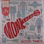 Der Text "THE MONKEES GOOD TIMES!" in Rot. Illustration von bunten Kleidungsstücken, Musikinstrumenten und Retro-Gegenständen., LP