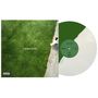 "JOY NEXT DOOR" zentral auf Gras, links ein Cover, rechts eine Vinyl-Schallplatte mit grünem Label., LP
