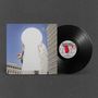 Text: "Swapmeet", "Mount Zero", "Wrap TYT". Rechte Seite: Schwarze Vinyl-Schallplatte. Links: Gebäude, Flügel und Schlüsselloch., LP