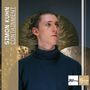 Text: "SIMON KUHN CONTAINMENT" und "Jazz thing NEXT GENERATION VOL. 114". Ein Mann im Rollkragenpullover vor Gongs., CD