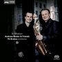 "In Motion Andreas Mader & Friends Pit Brosius conductor" steht auf dem Cover. Zwei Männer, einer mit Saxophon., Super Audio CD