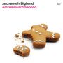 Text: "Jazzrausch Bigband Am Weihnachtsabend". Ein angebissener Lebkuchenmann mit zerbrochenem Kopf und Zuckerglasur.